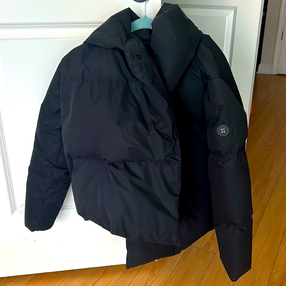 Sweaty Betty wrap puffer jacket with hood.